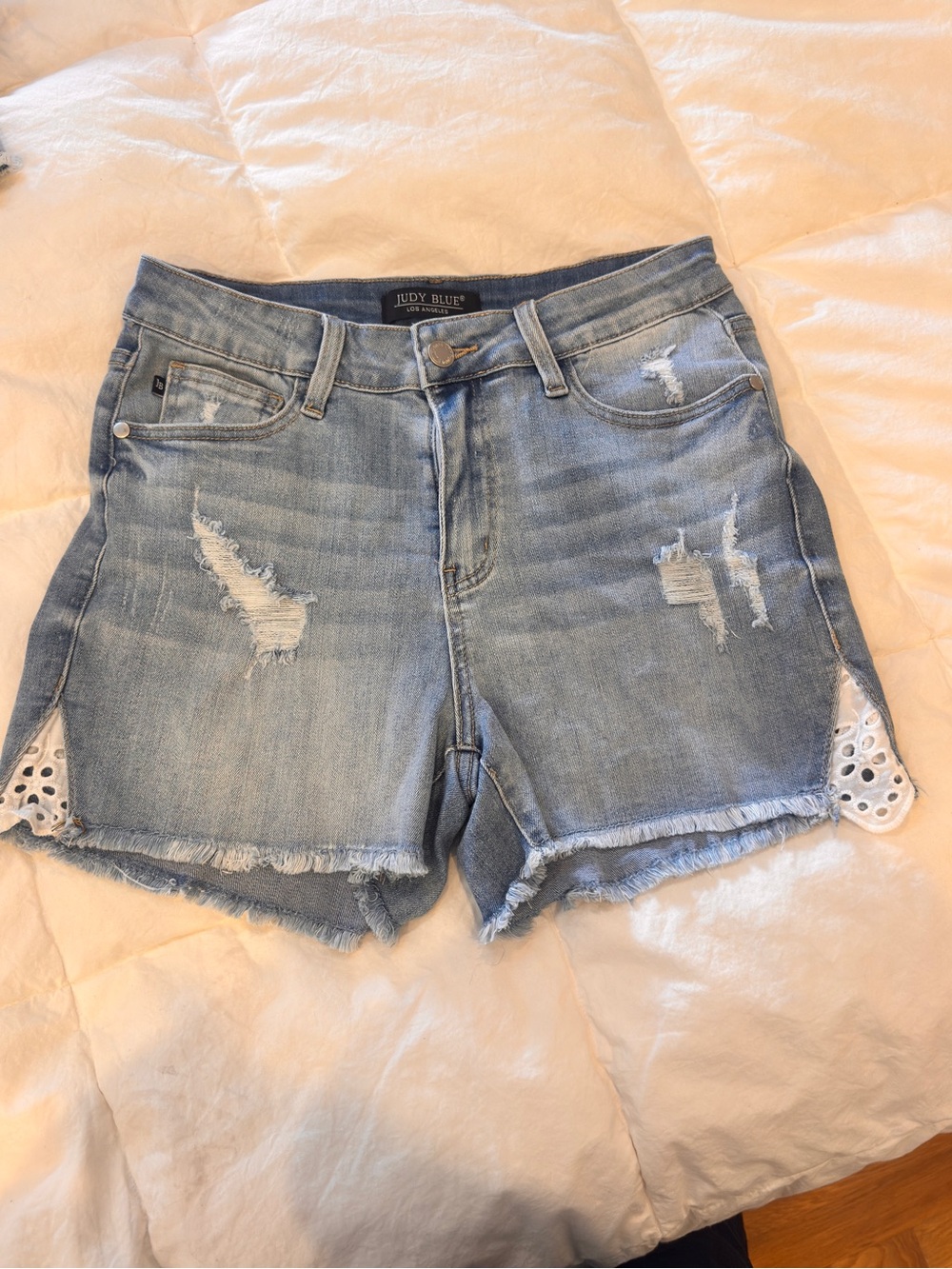 Judy Blue Light Wash Distressed Denim Shorts with Eyelet Side Trim